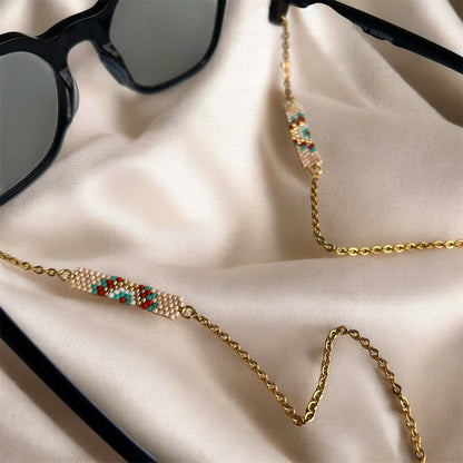 CUELGA GAFAS ORIGEN